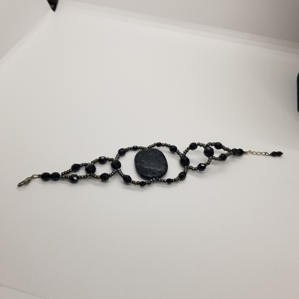 open beadwork bracelet with large flat stone